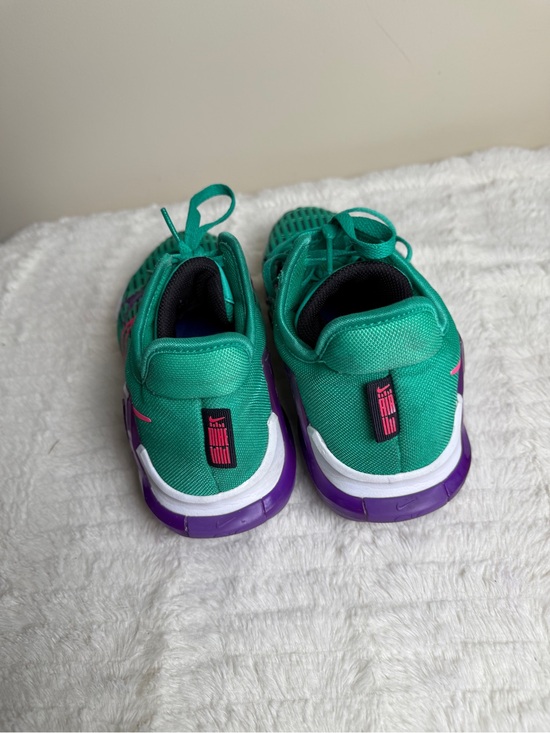 Nike Green Athletic Shoes with Purple Heel and Pink Swoosh